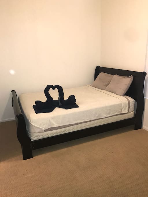 Queen size bed in the room