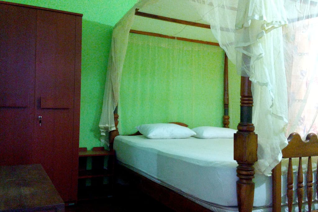 double Bedroom no.1 equipped with double Bed, Closet, Desk, Chair, and Fan