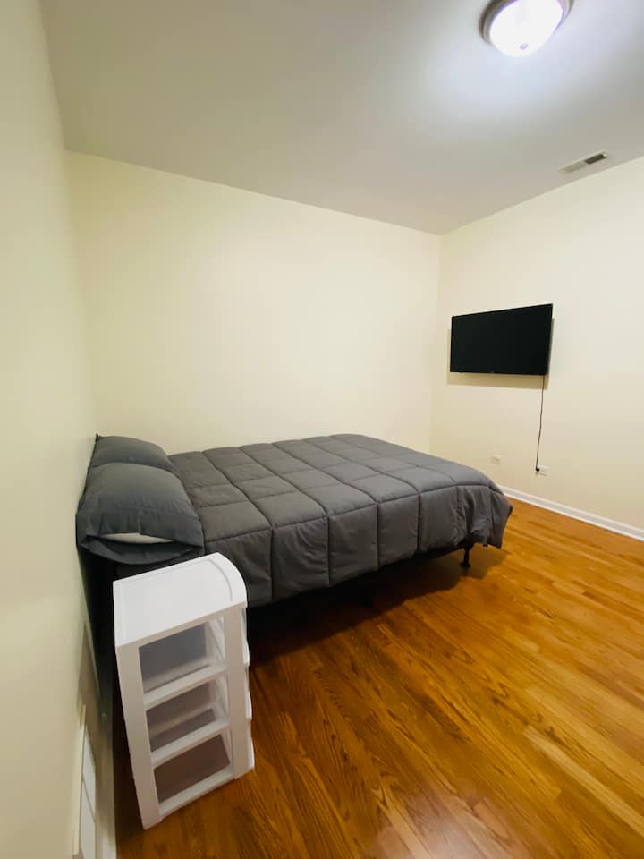 Extra large room with queen size bed, 43in’ smart-tv, computer desk with adjustable chair, walk-in closet, nightstand with 3 drawers and garbage can. 