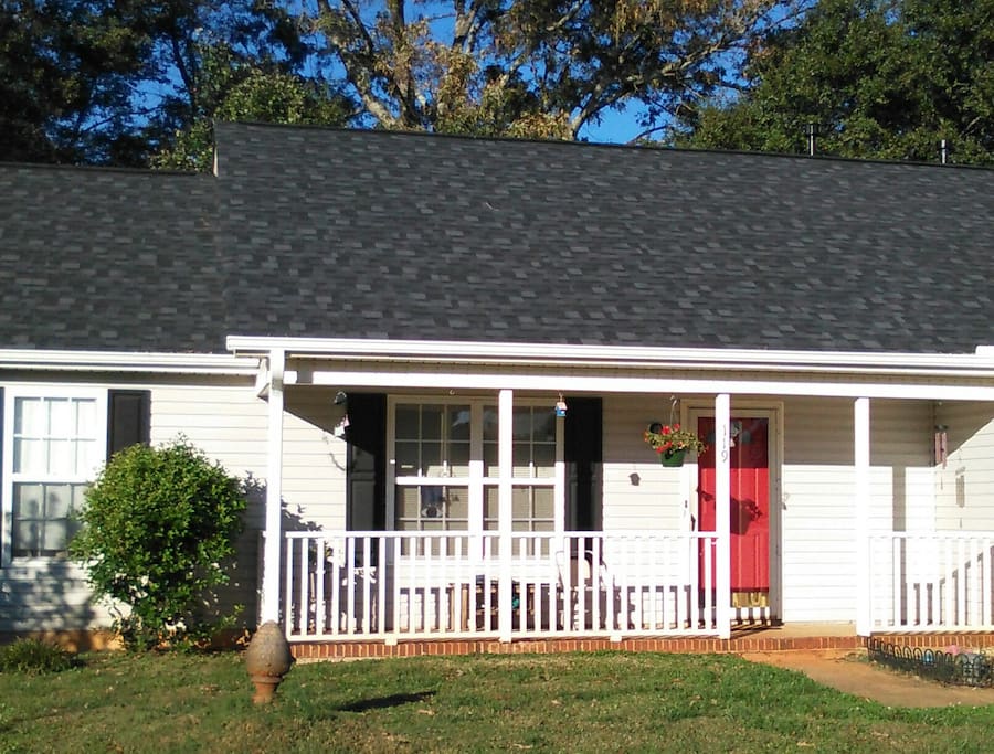 Single level home on cul de sac with driveway parking.
