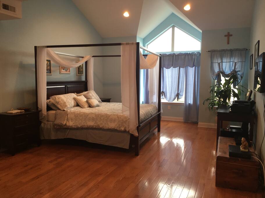 Bedroom # 4 Spacious Master Suite with King Bed, large tv, Internet and extra room for two queen size blow up mattresses