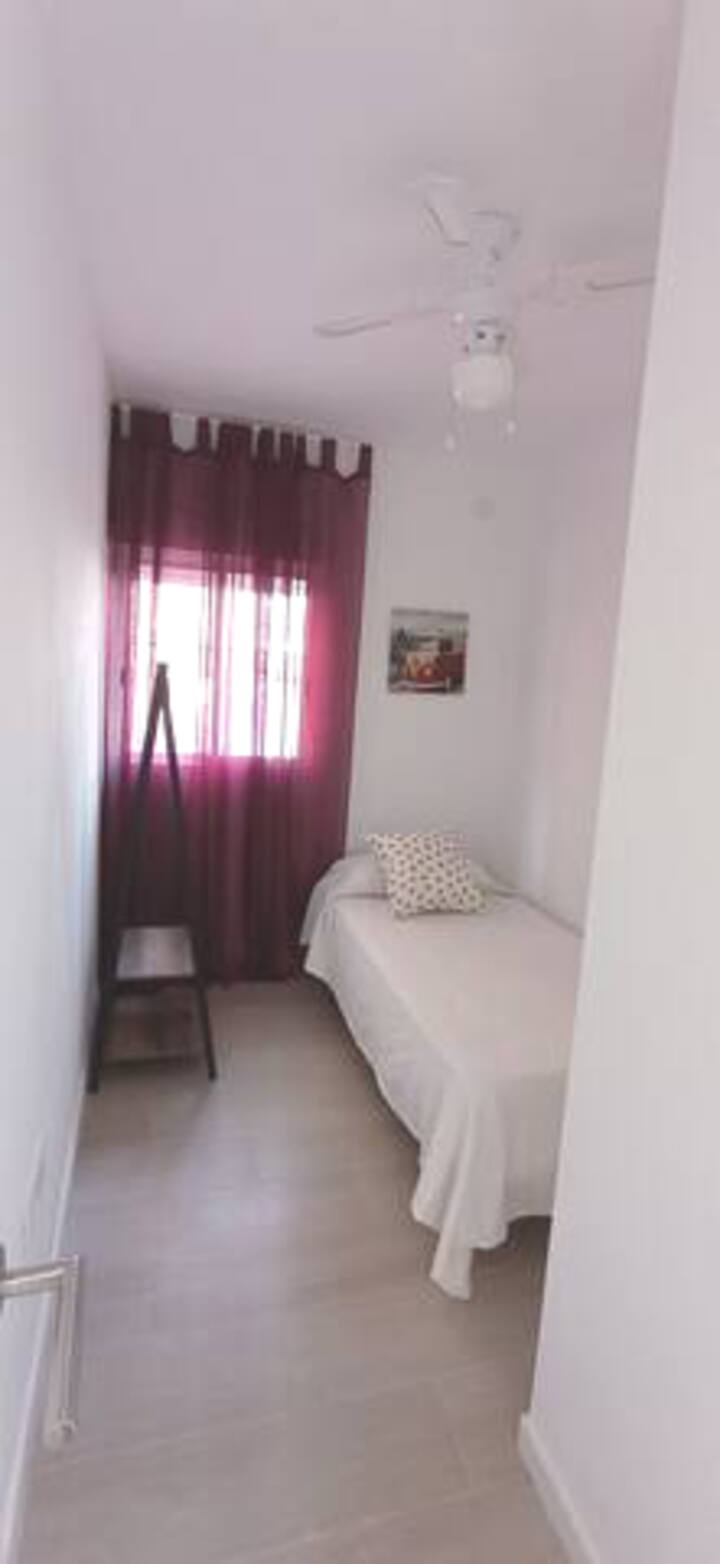 ห้องนอนพร้อมเตียงเดี่ยว