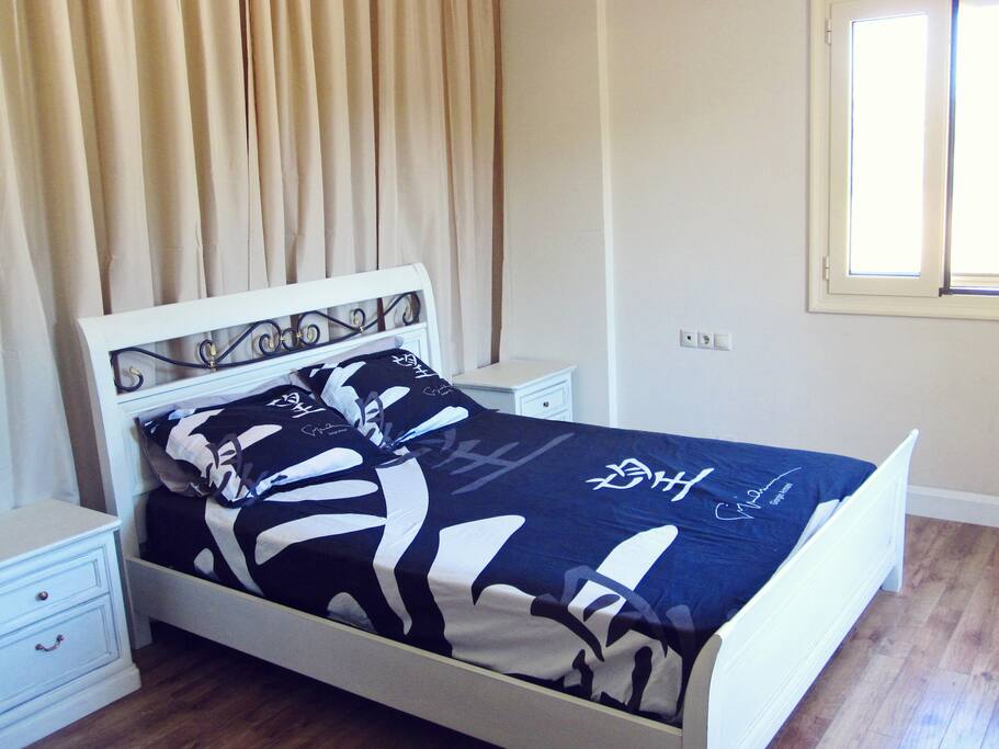 This vintage bed was painted anew by us and given a new life.