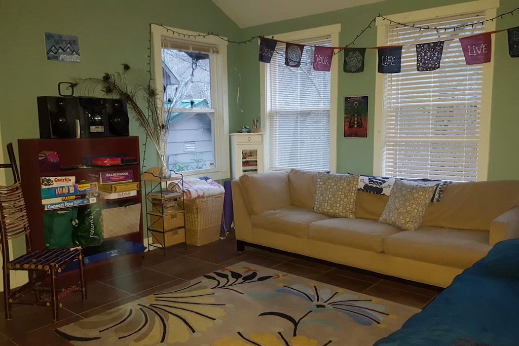Extra couch for lounging or third person to sleep in (It's very comfy!) Shelf of board games for quiet nights with no technology....or have your own dance party with the stereo:)