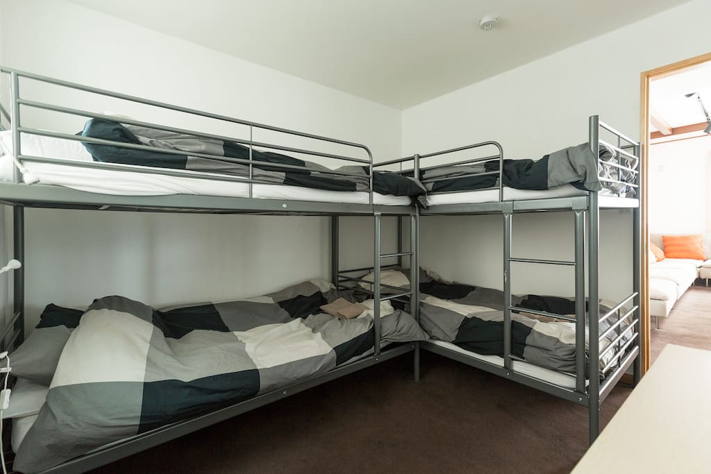 Bedroom with a few bunk beds - perfect for kids or groups of friends