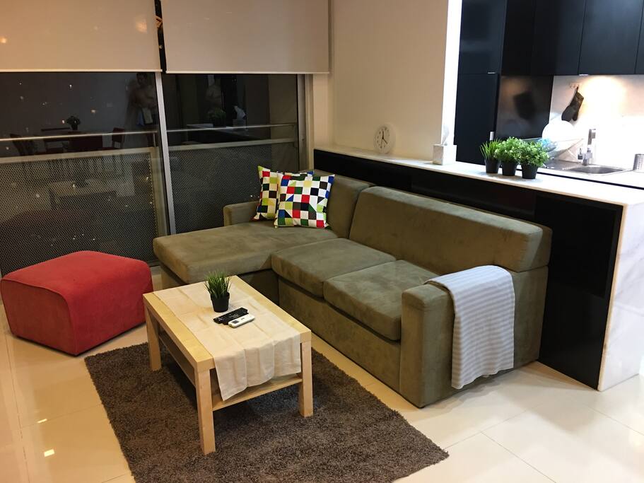 Nice and cosy sofa arrangement. It can be rearranged to make it as a single bed.