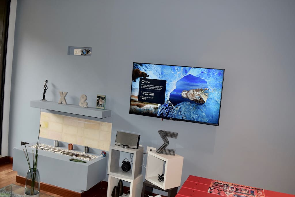 Flat screen and cozy gas fireplace