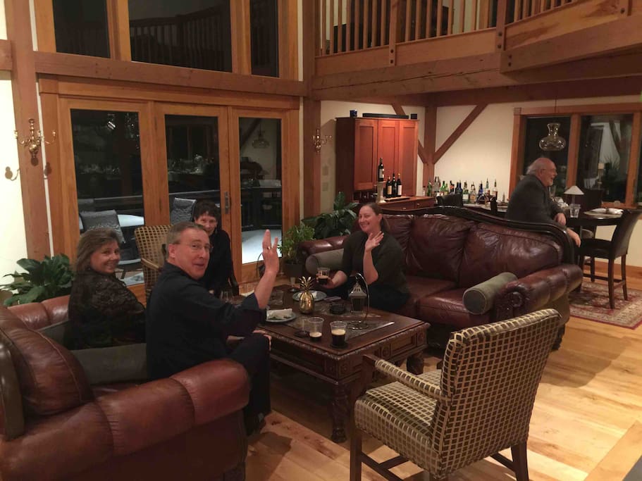 Guests enjoying a winter's evening in front of the fireplace!