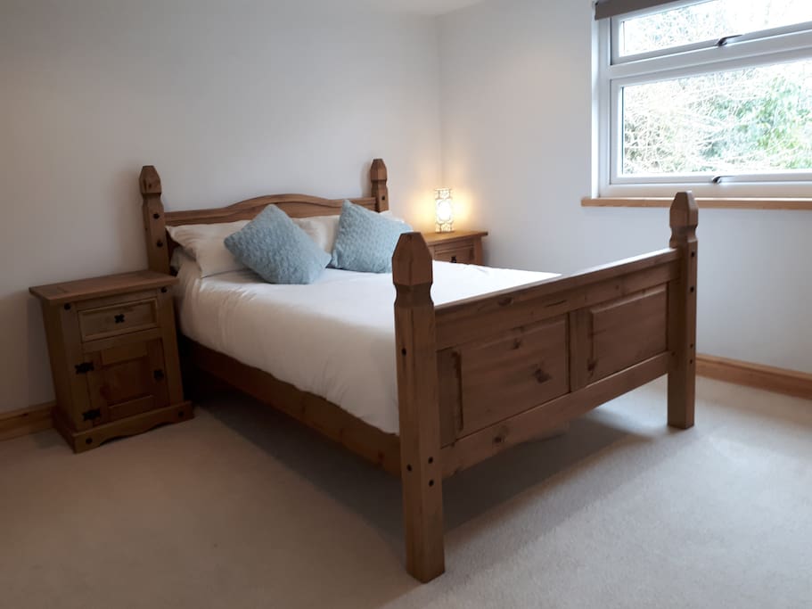 Comfortable double bedroom to rear of the house.