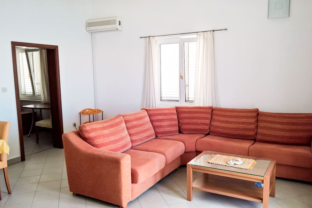 Living room with kitchen and dining room