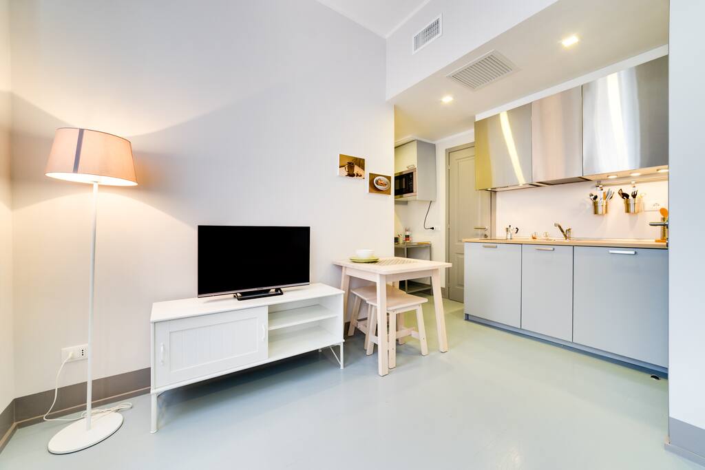 The living room with the open kitchen