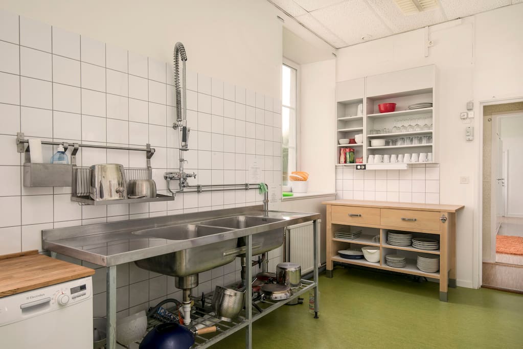 Large and fully equipped common kitchen.