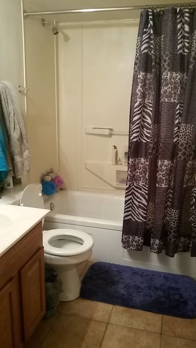 The bathroom is next to the bedroom