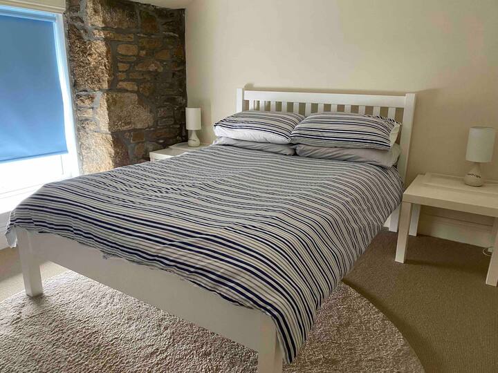 Double Room, has a built in wardrobe and draws. There is a small tv in this room.