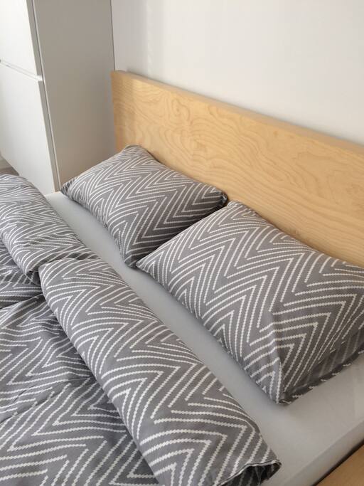 Your bed in your room. Your room is on the backyard side of apartment and full of light.