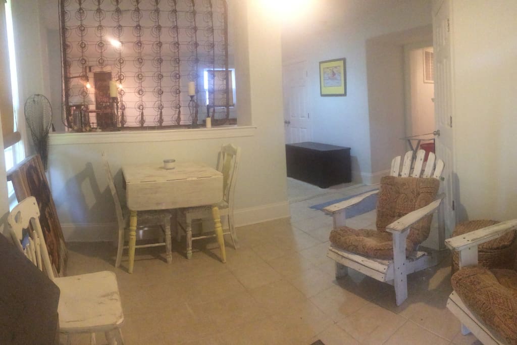 Living area with bedroom in background