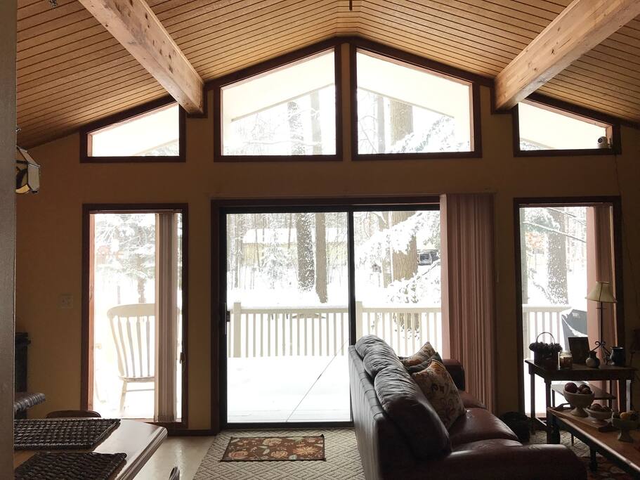 Living room view out towards front yard and front deck.