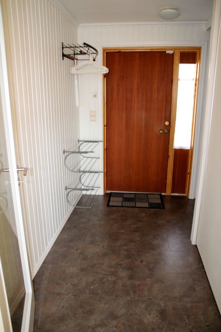Spacious hallway with a loot of room for clotes and shoes.