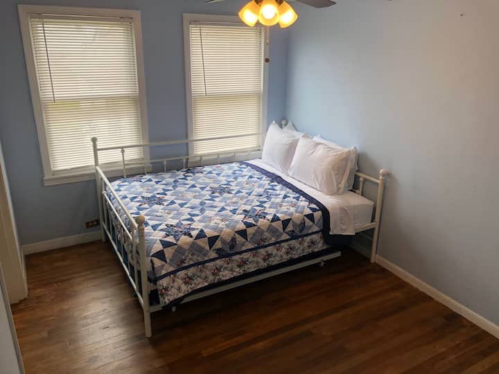 Queen bed with full size trundle bed underneath. 