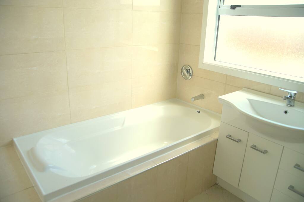 Shared tiled bathroom
