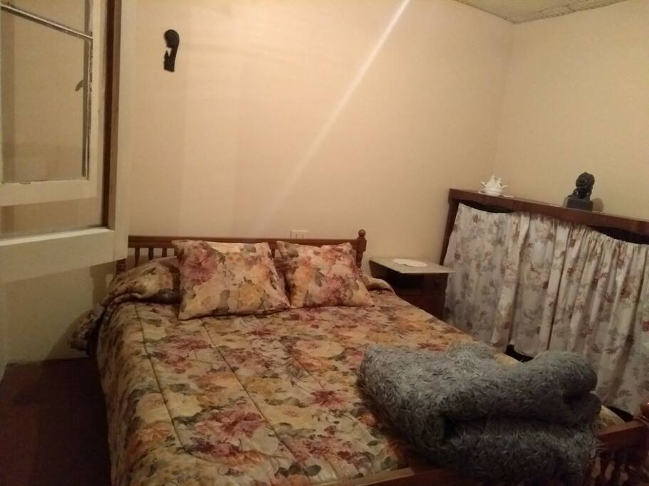 dormitorio principal cabaña del medio