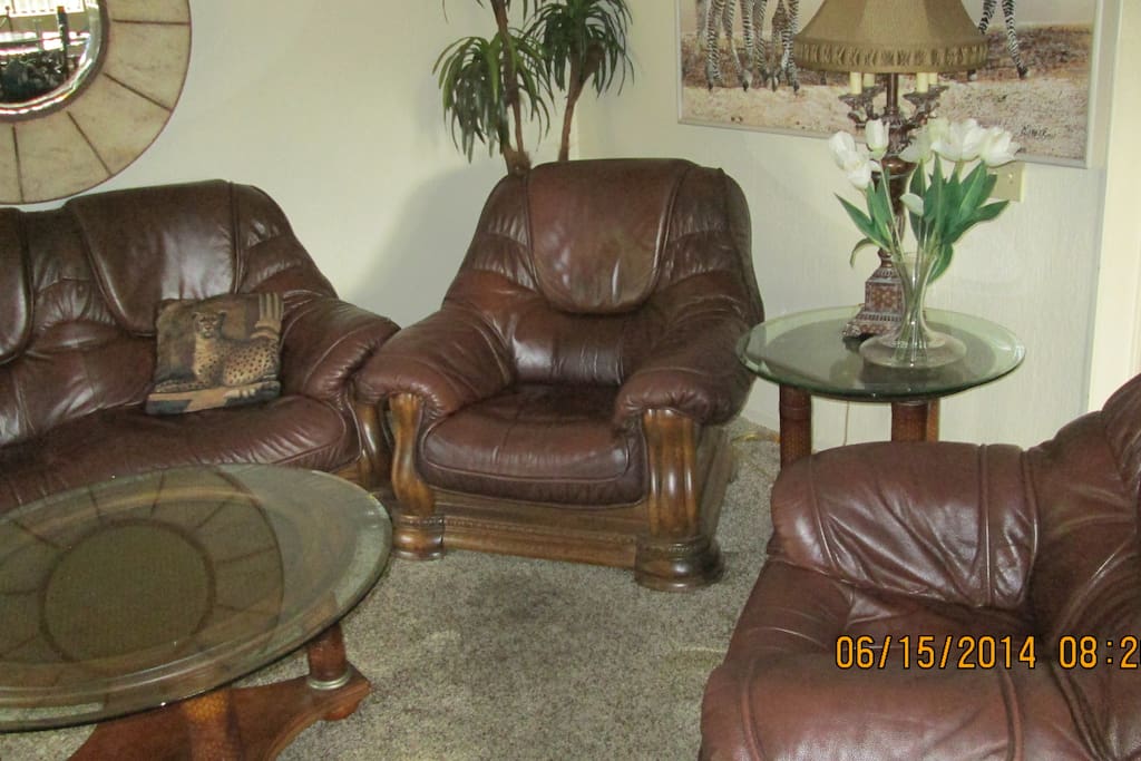 Newer leather chairs and sofa.