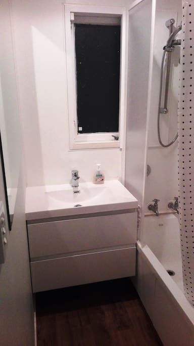 Clean bathroom with shower-bath