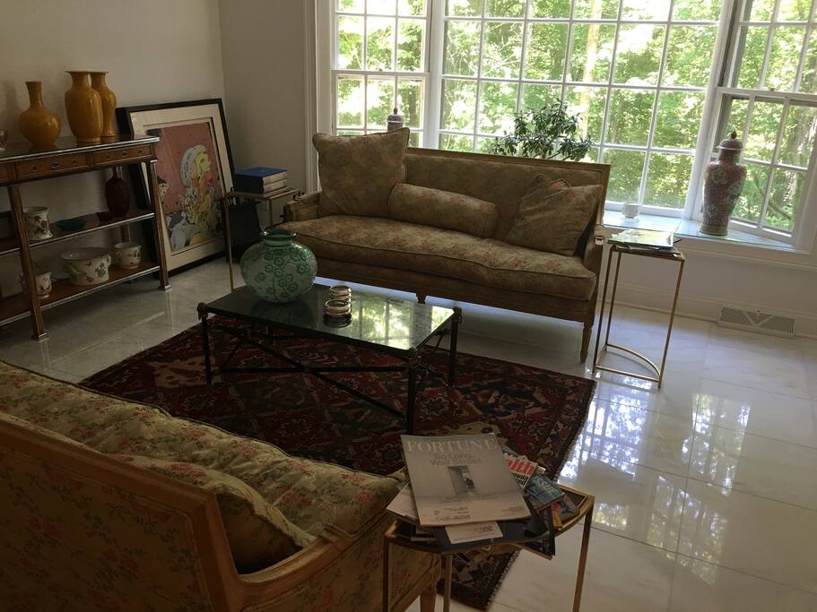 The den flows off the kitchen in an open concept layout.