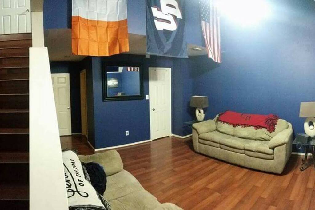 Recently refloored master bedroom, the king size bed is in the loft above and that sofa is a pull out.
