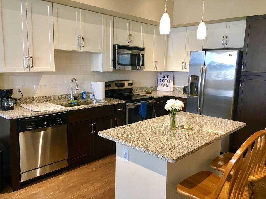 Large Kitchen with New Stainless Steel Appliances