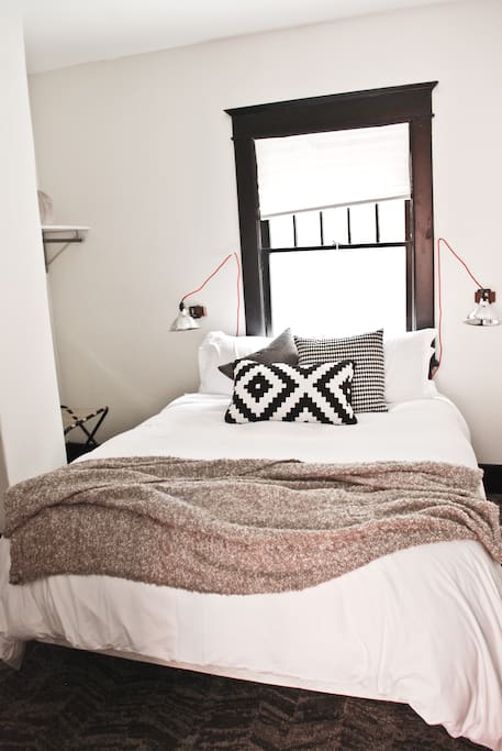 The 2nd bedroom is small, but comfortable w/ a queen sized matress. (Side tables coming soon!)