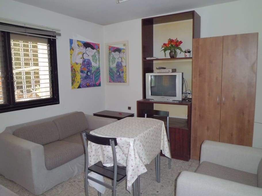 Couches, TV cupboards and table and chairs