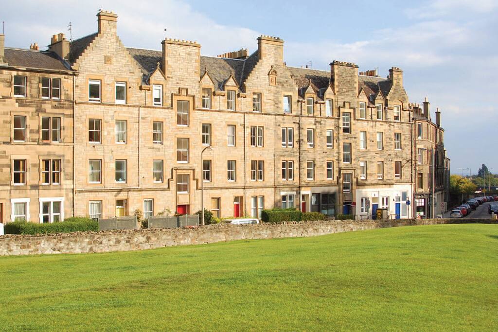 Top floor right hand apartment access through red door