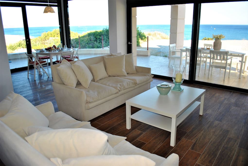 Open plan sitting room/kitchen/dining room with 180 degrees sea view!