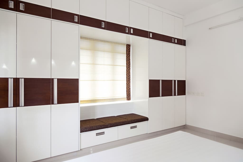 Unique window-bay seating/couch to ponder and discuss.