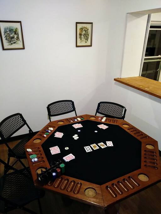 Playing surface flips over easily to become the main dining table