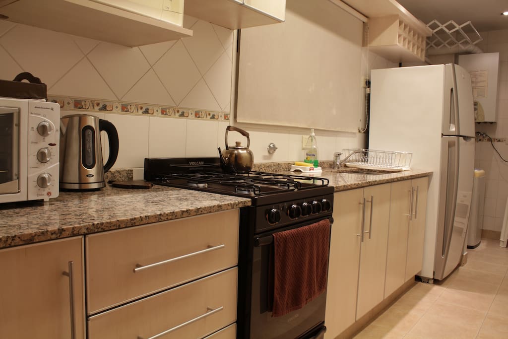 You'll find everything you need in a fully equipped kitchen: big no-frost refrigerator, gas stove/oven, microwave, toaster oven, toaster, regular/electric kettle, cooking utensils.