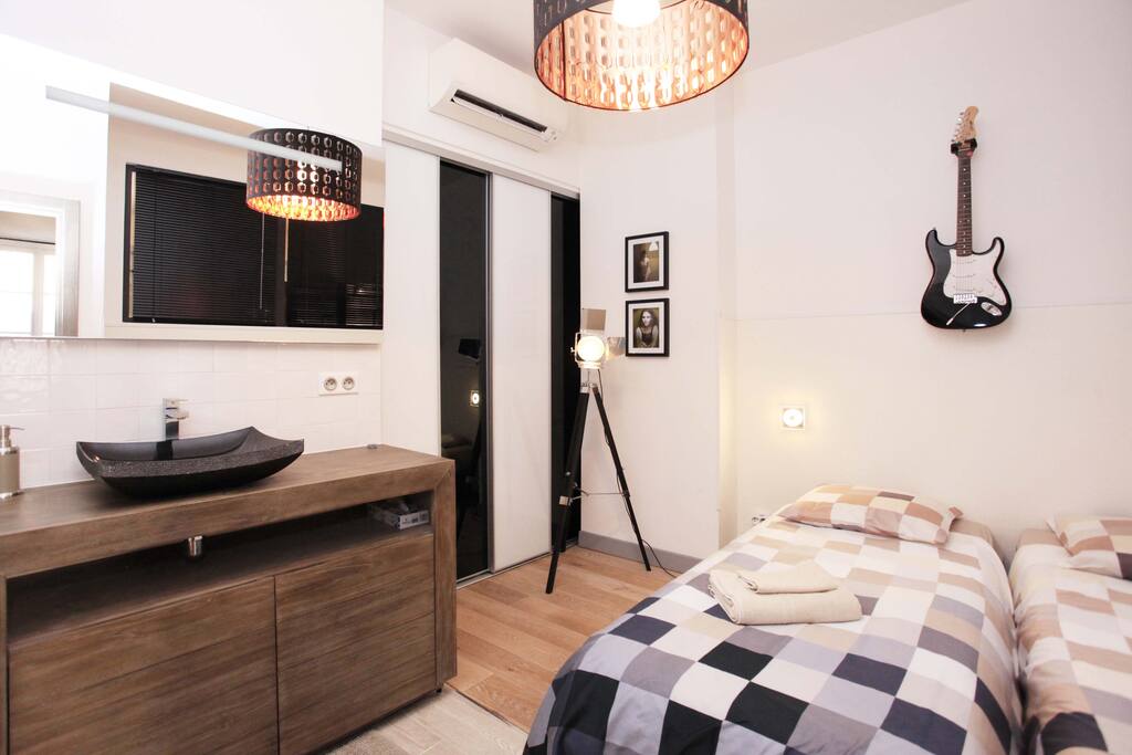 chambre "verrière" climatisée