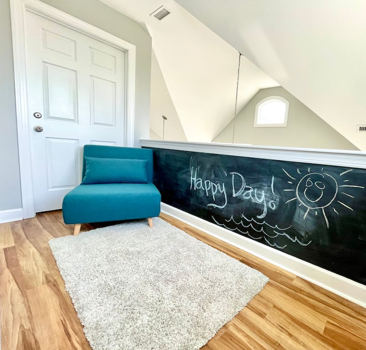 The kids will love the huge chalkboard wall in the loft. Mom me Dad will love the flip bed/chaise for reading or sleeping. 30x75” when fully open, best for a child.  This isn’t counted in the 11  sleeping spots but is an extra option.  