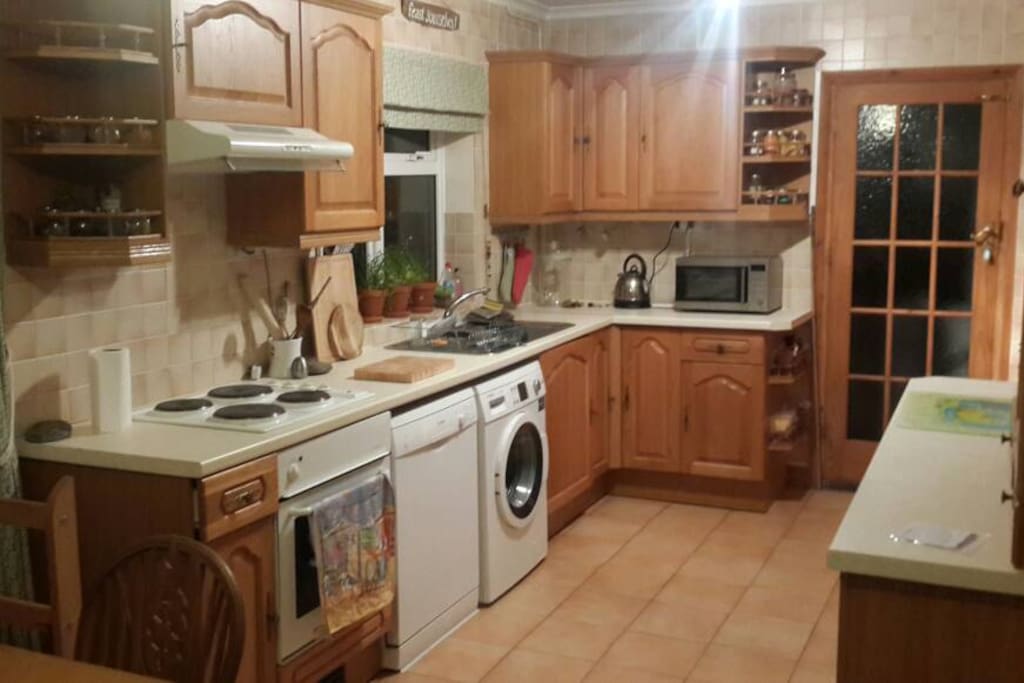 Big kitchen with washing machine, pantry and dishwasher