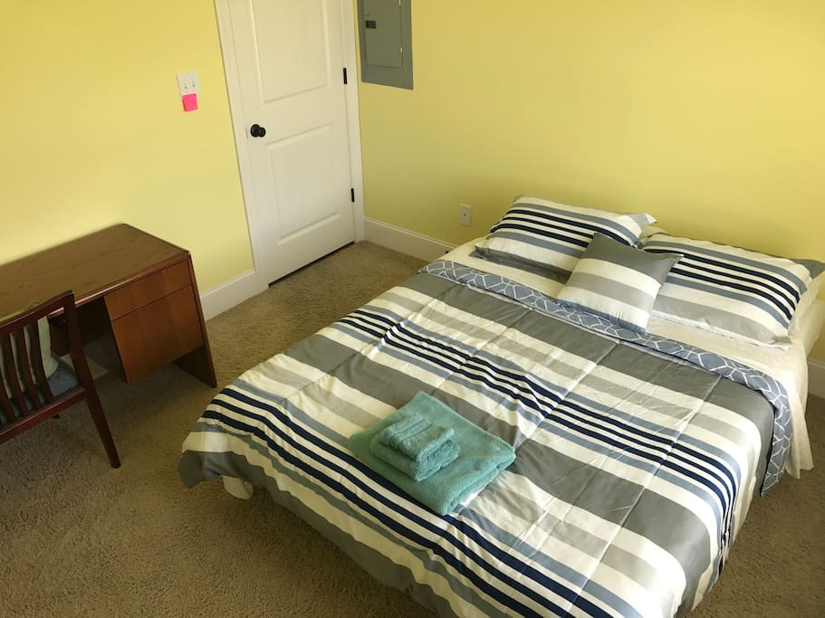 That's the corner view to your bedroom. We offer each of our guest with a study / work desk with an arm chair.