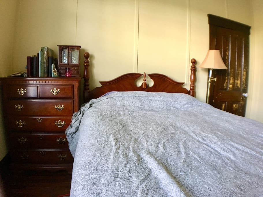 This is our cozy queen bed in the original Masters Suite.