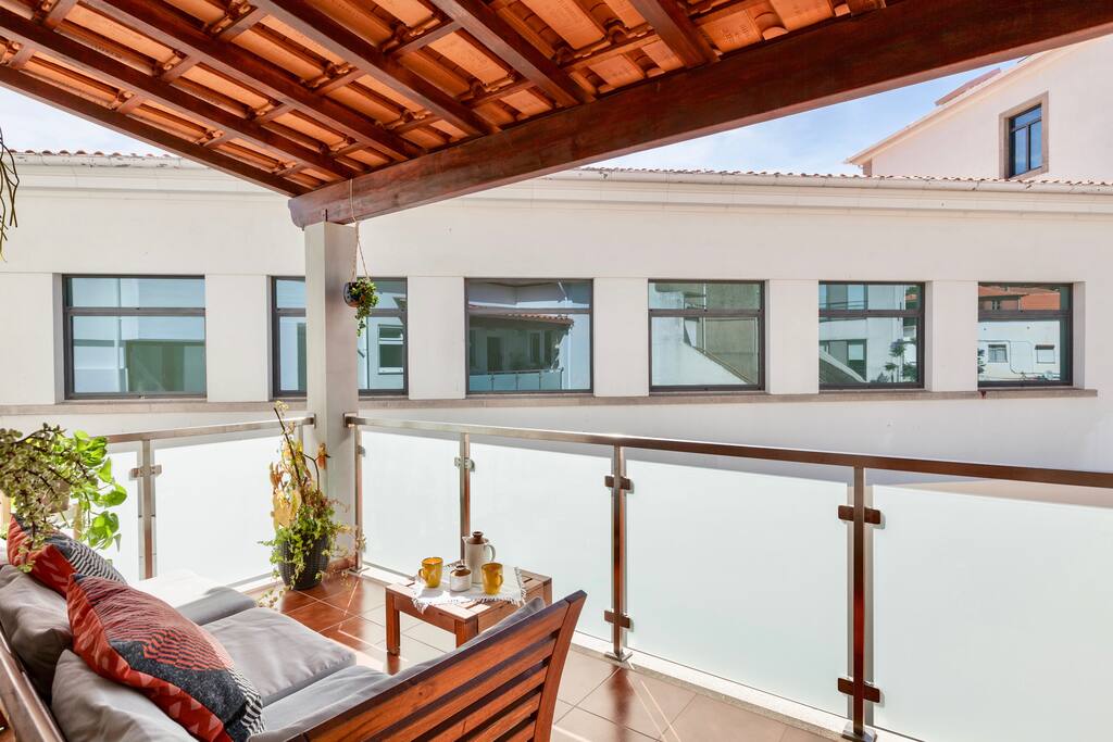Balcony is composed by comfortable couch and all day sunlight