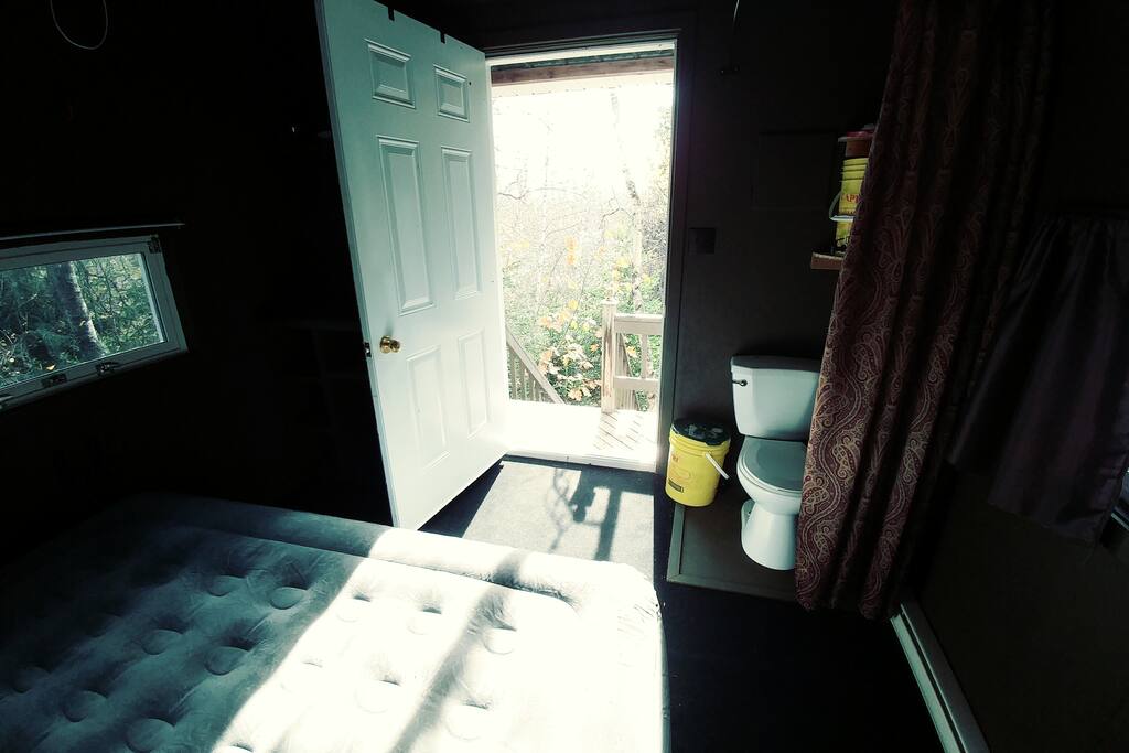 Inside the treehouse, door open