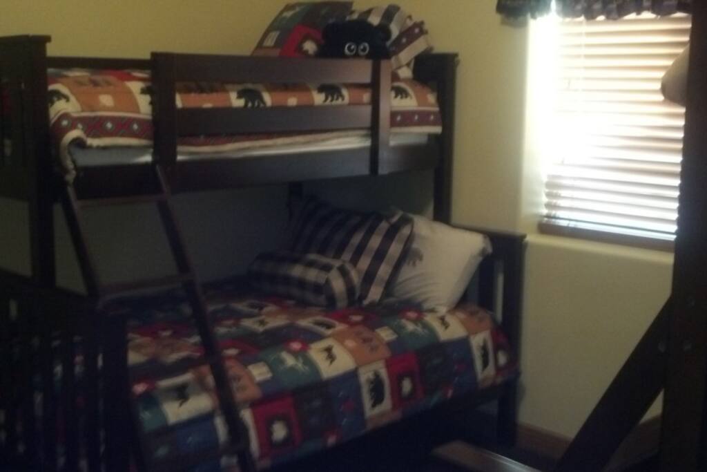 there are 2 sets of bunk beds with double on the bottom & twin on the top. There are 2 bedrooms with this set up of beds.