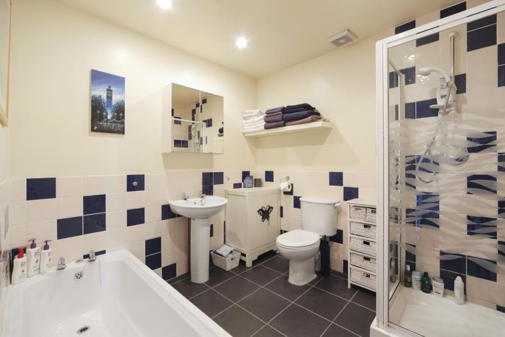 Large bathroom with both bath and shower