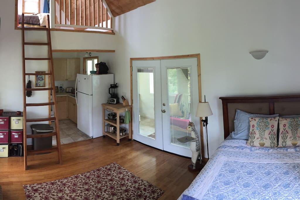 View of loft bed from main studio room