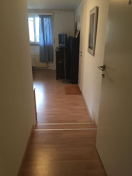 Connection between corridor and studio entrance