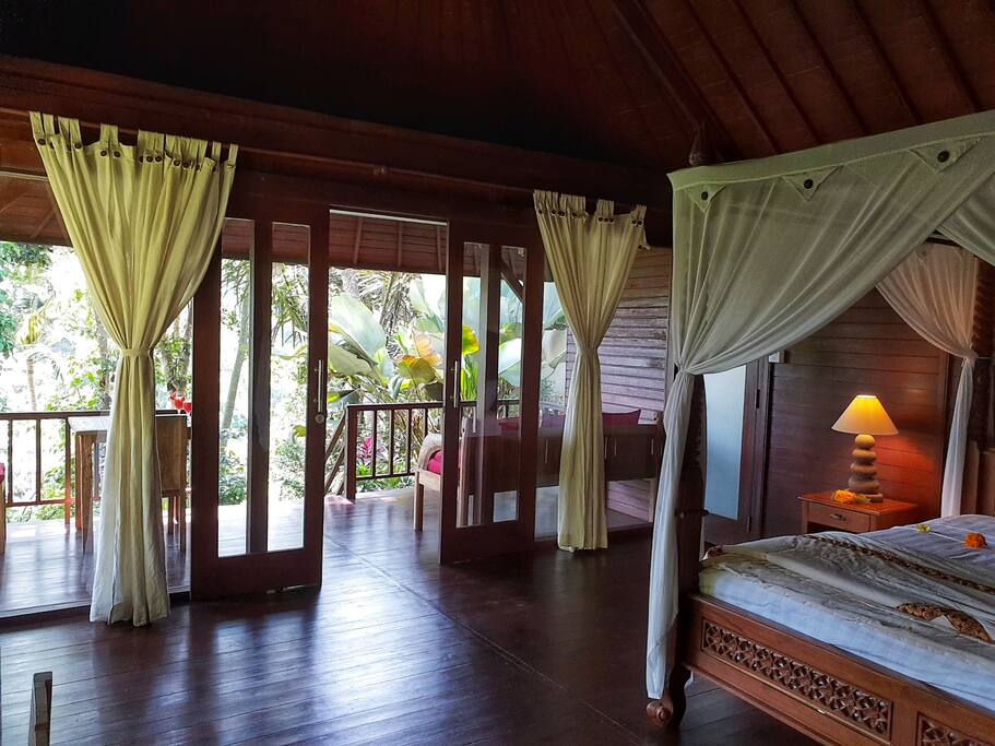 Queen size bed provide with romantic mosquito net