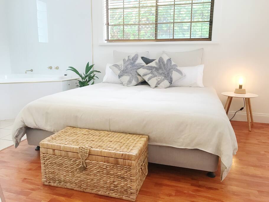 Your main bedroom with luxury king size bed, ensuite spa and walk in wardrobe.